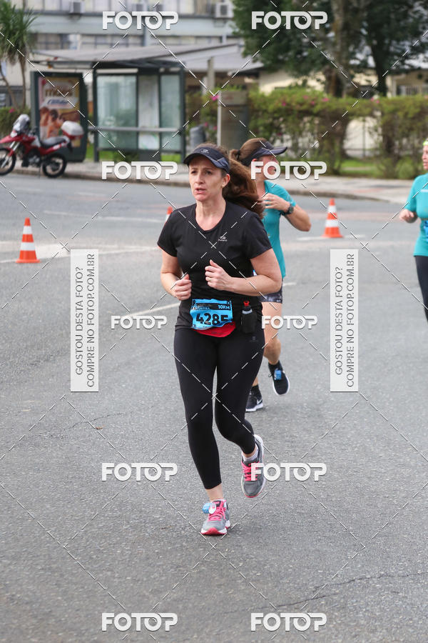 Buy your photos of the eventMeia Maratona Internacional de Curitiba 2018 on Fotop