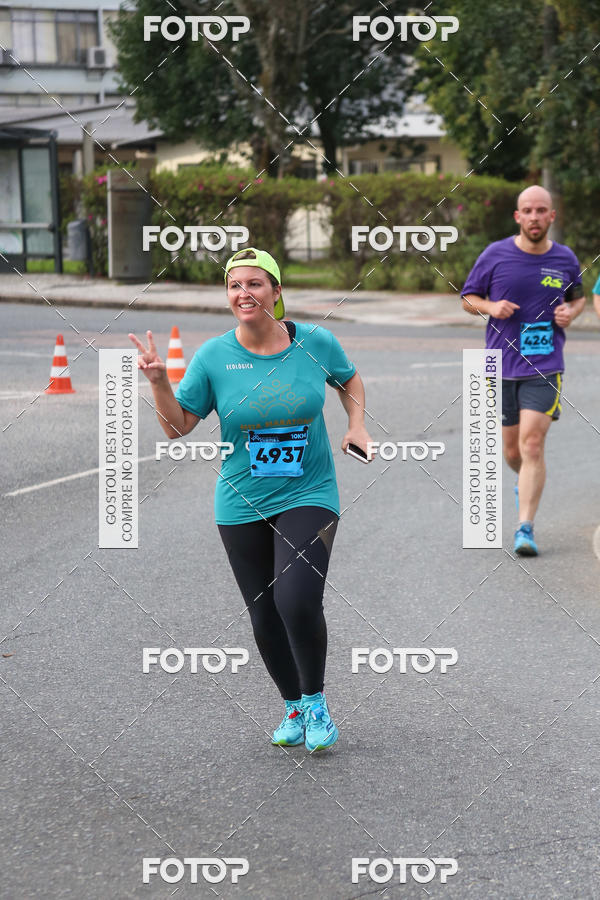 Buy your photos of the eventMeia Maratona Internacional de Curitiba 2018 on Fotop