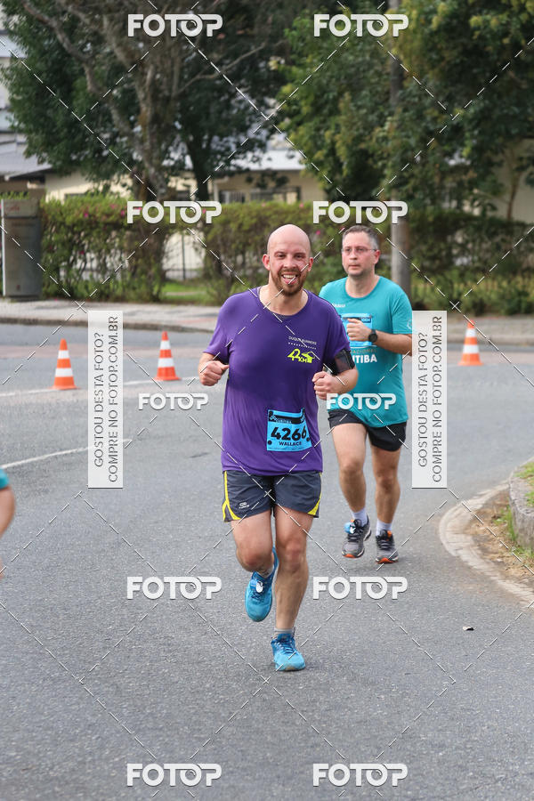 Buy your photos of the eventMeia Maratona Internacional de Curitiba 2018 on Fotop