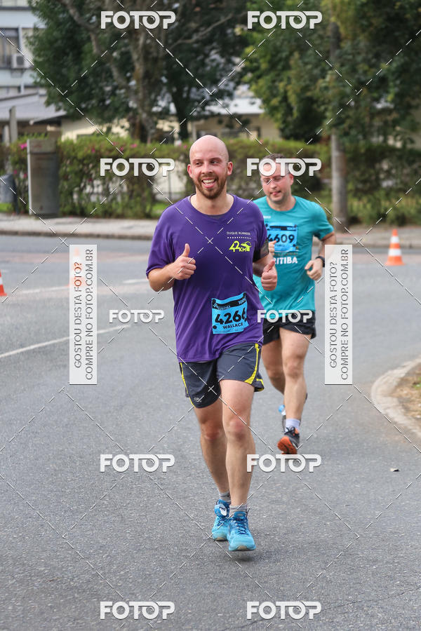 Buy your photos of the eventMeia Maratona Internacional de Curitiba 2018 on Fotop