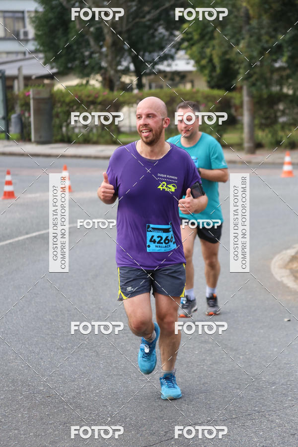 Buy your photos of the eventMeia Maratona Internacional de Curitiba 2018 on Fotop