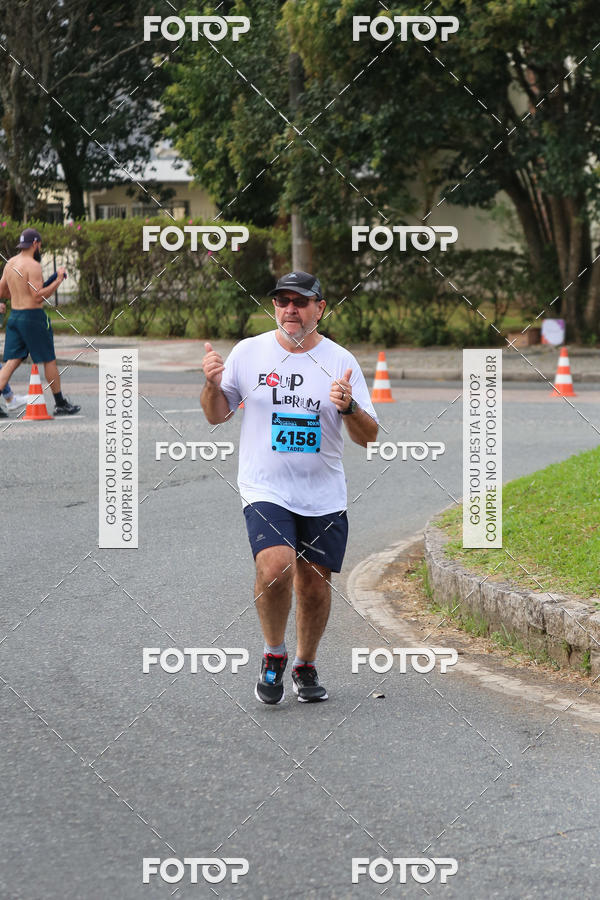 Buy your photos of the eventMeia Maratona Internacional de Curitiba 2018 on Fotop