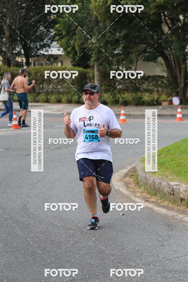 Buy your photos of the eventMeia Maratona Internacional de Curitiba 2018 on Fotop