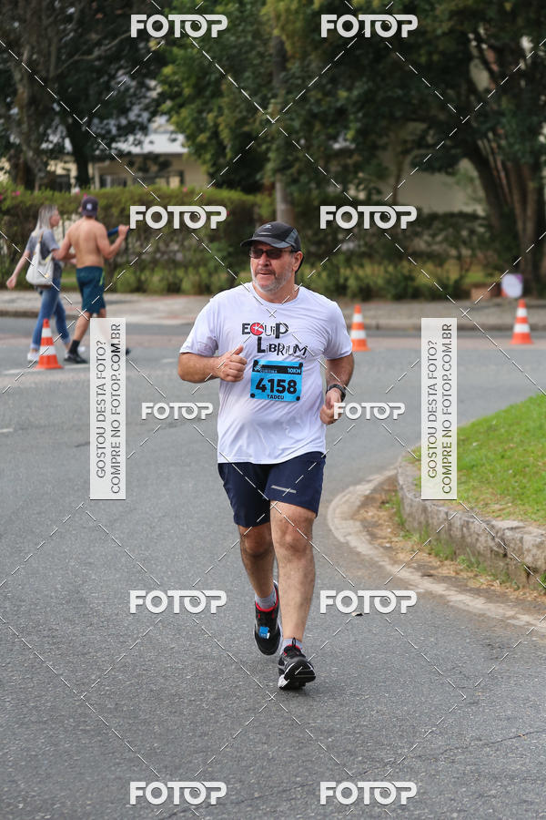 Buy your photos of the eventMeia Maratona Internacional de Curitiba 2018 on Fotop