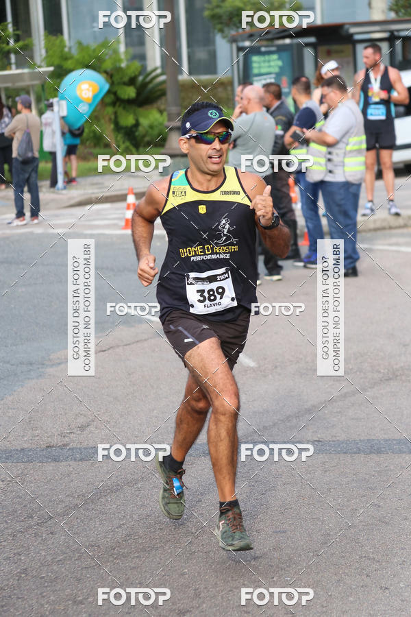 Buy your photos of the eventMeia Maratona Internacional de Curitiba 2018 on Fotop