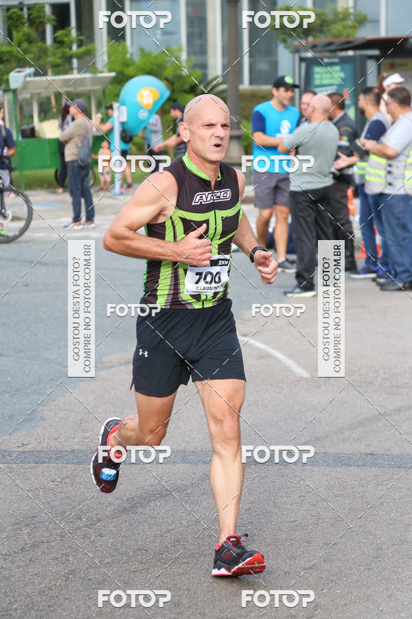 Buy your photos of the eventMeia Maratona Internacional de Curitiba 2018 on Fotop