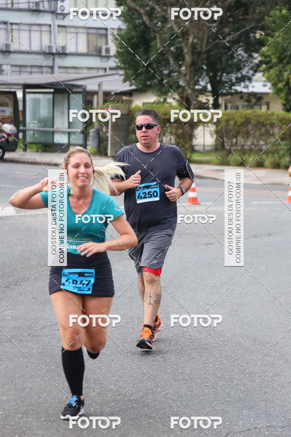 Buy your photos of the eventMeia Maratona Internacional de Curitiba 2018 on Fotop
