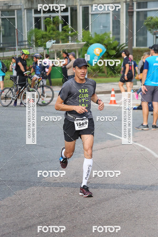 Buy your photos of the eventMeia Maratona Internacional de Curitiba 2018 on Fotop