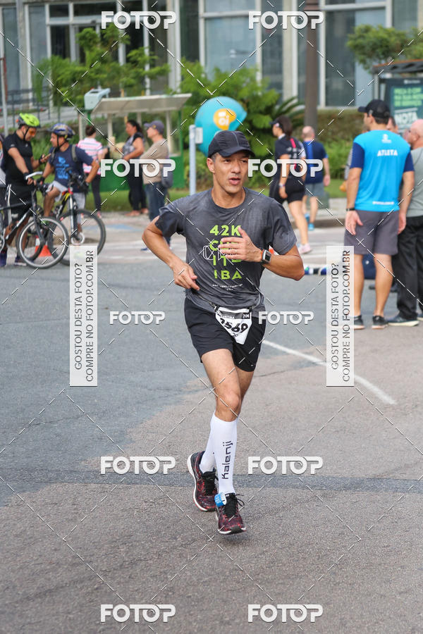 Buy your photos of the eventMeia Maratona Internacional de Curitiba 2018 on Fotop