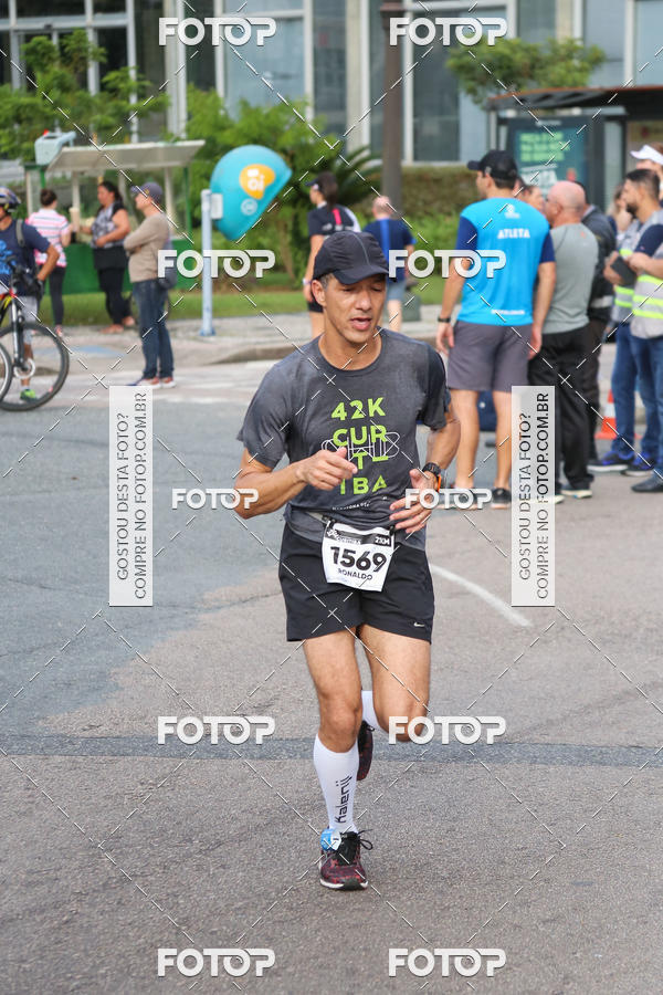 Buy your photos of the eventMeia Maratona Internacional de Curitiba 2018 on Fotop