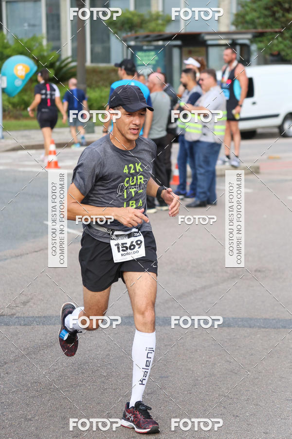 Buy your photos of the eventMeia Maratona Internacional de Curitiba 2018 on Fotop