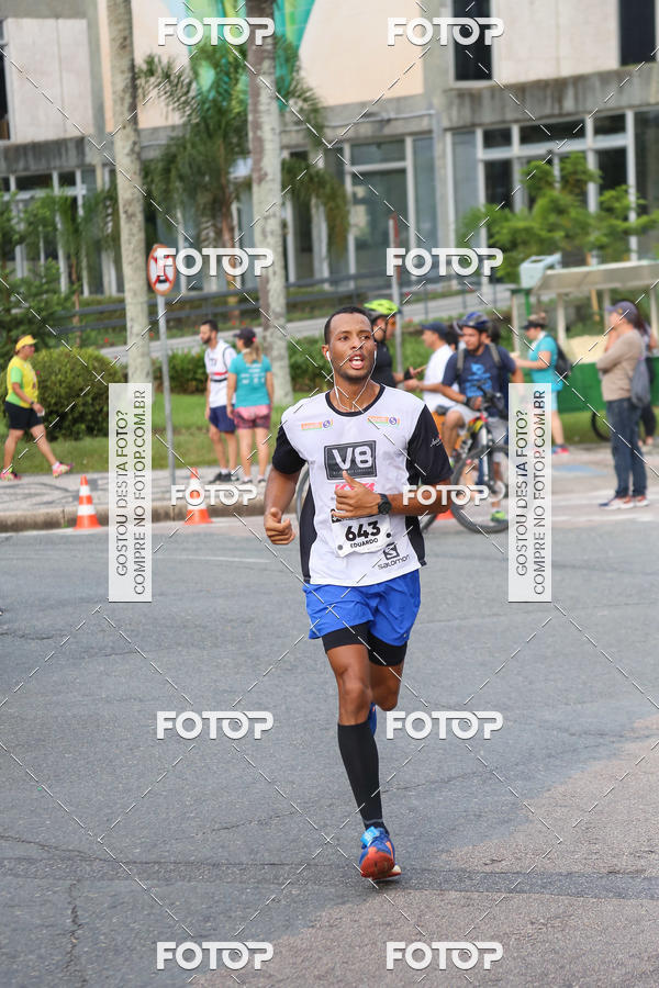 Buy your photos of the eventMeia Maratona Internacional de Curitiba 2018 on Fotop