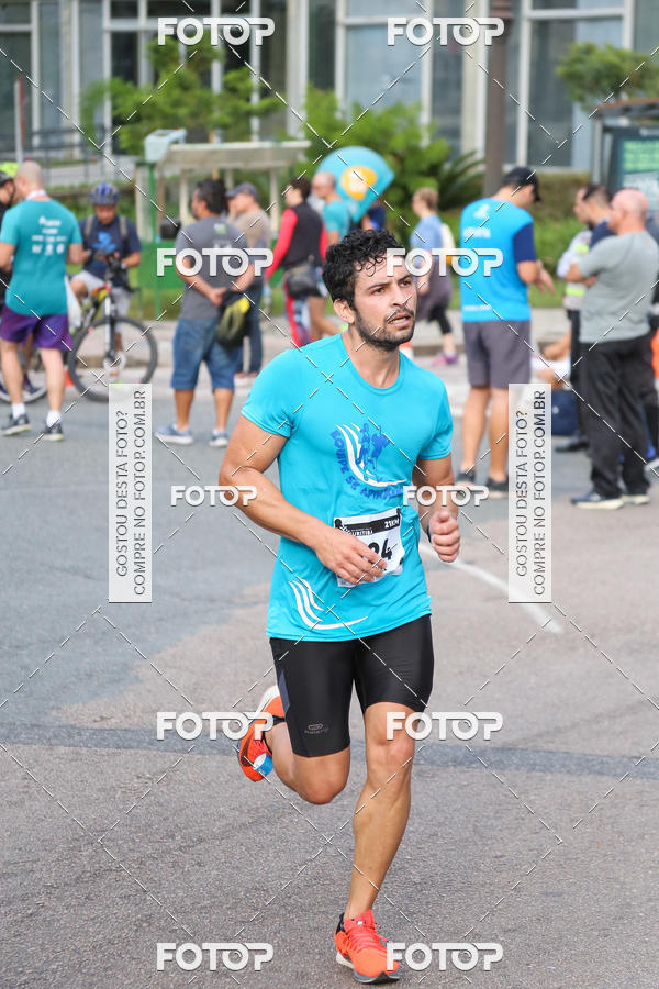 Buy your photos of the eventMeia Maratona Internacional de Curitiba 2018 on Fotop