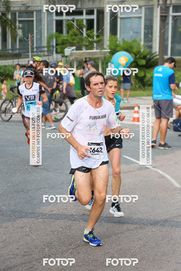 Buy your photos of the eventMeia Maratona Internacional de Curitiba 2018 on Fotop