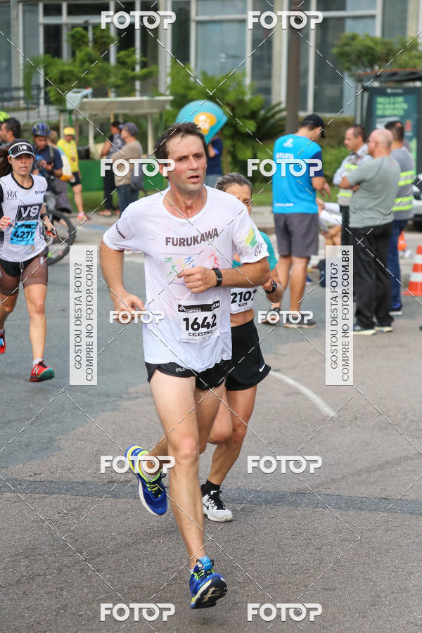 Buy your photos of the eventMeia Maratona Internacional de Curitiba 2018 on Fotop
