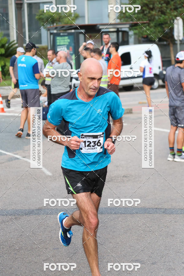 Buy your photos of the eventMeia Maratona Internacional de Curitiba 2018 on Fotop