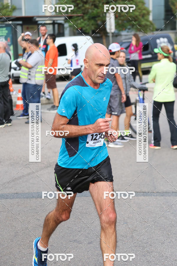 Buy your photos of the eventMeia Maratona Internacional de Curitiba 2018 on Fotop