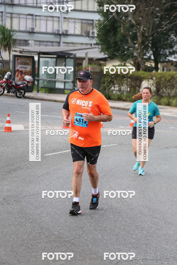 Buy your photos of the eventMeia Maratona Internacional de Curitiba 2018 on Fotop
