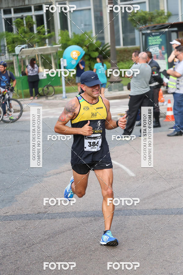 Buy your photos of the eventMeia Maratona Internacional de Curitiba 2018 on Fotop