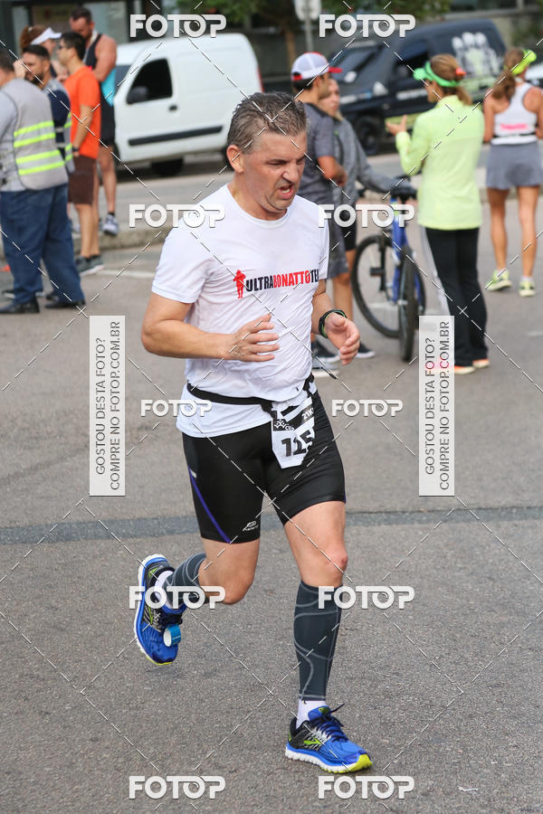 Buy your photos of the eventMeia Maratona Internacional de Curitiba 2018 on Fotop