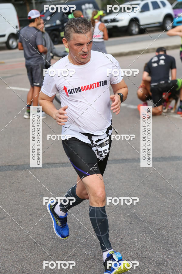 Buy your photos of the eventMeia Maratona Internacional de Curitiba 2018 on Fotop