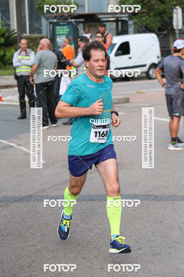 Buy your photos of the eventMeia Maratona Internacional de Curitiba 2018 on Fotop