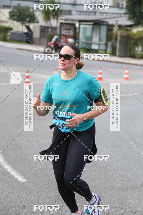 Buy your photos of the eventMeia Maratona Internacional de Curitiba 2018 on Fotop