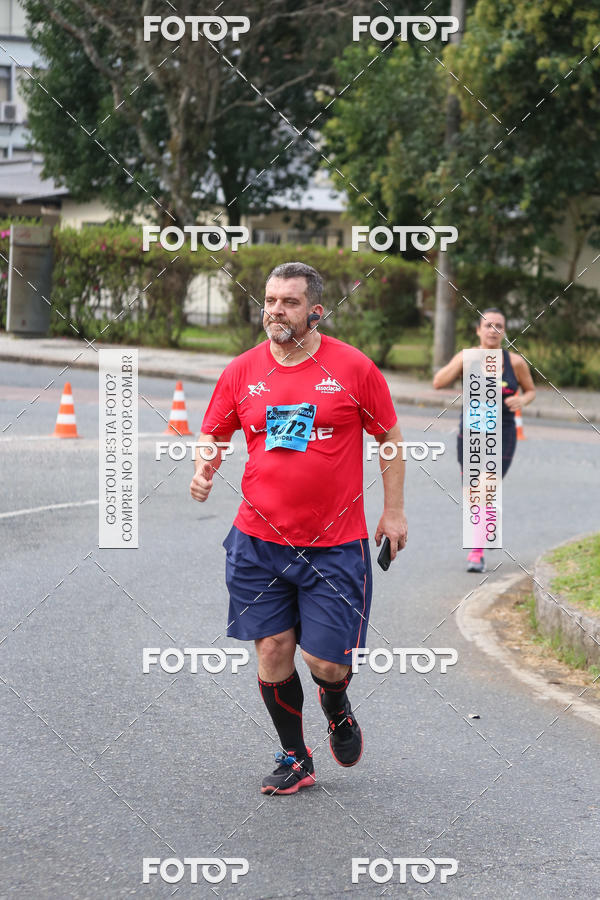 Buy your photos of the eventMeia Maratona Internacional de Curitiba 2018 on Fotop
