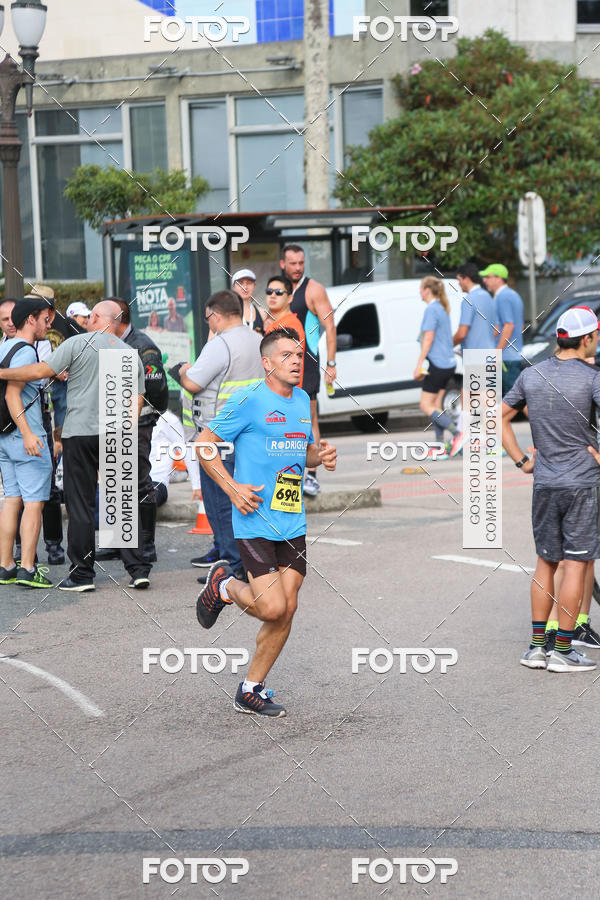 Buy your photos of the eventMeia Maratona Internacional de Curitiba 2018 on Fotop