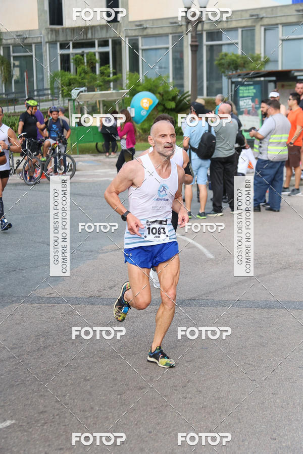 Buy your photos of the eventMeia Maratona Internacional de Curitiba 2018 on Fotop