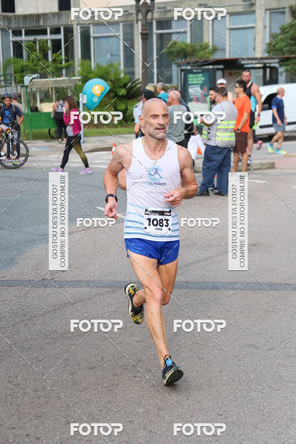 Buy your photos of the eventMeia Maratona Internacional de Curitiba 2018 on Fotop