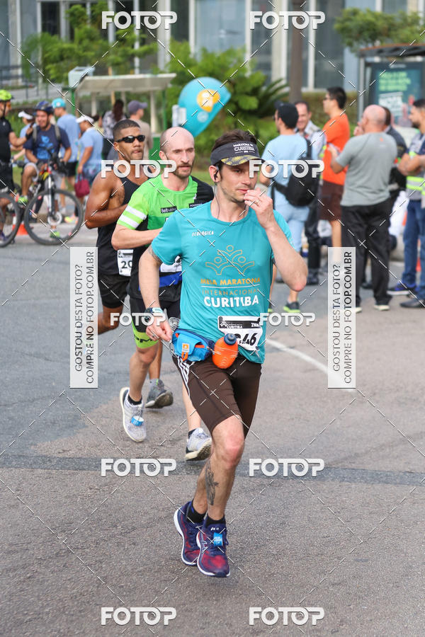 Buy your photos of the eventMeia Maratona Internacional de Curitiba 2018 on Fotop
