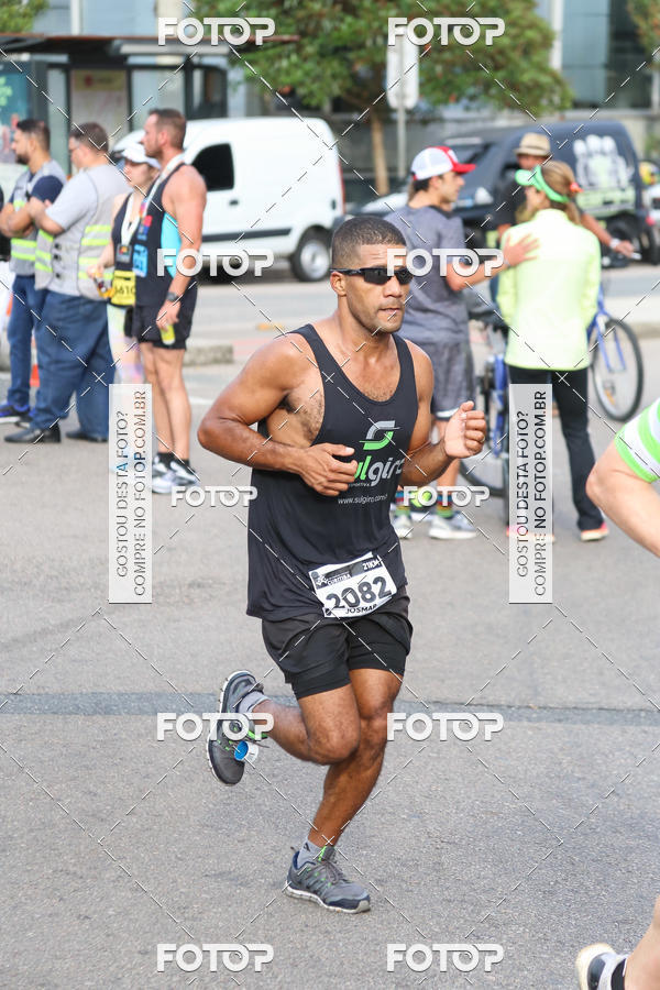 Buy your photos of the eventMeia Maratona Internacional de Curitiba 2018 on Fotop