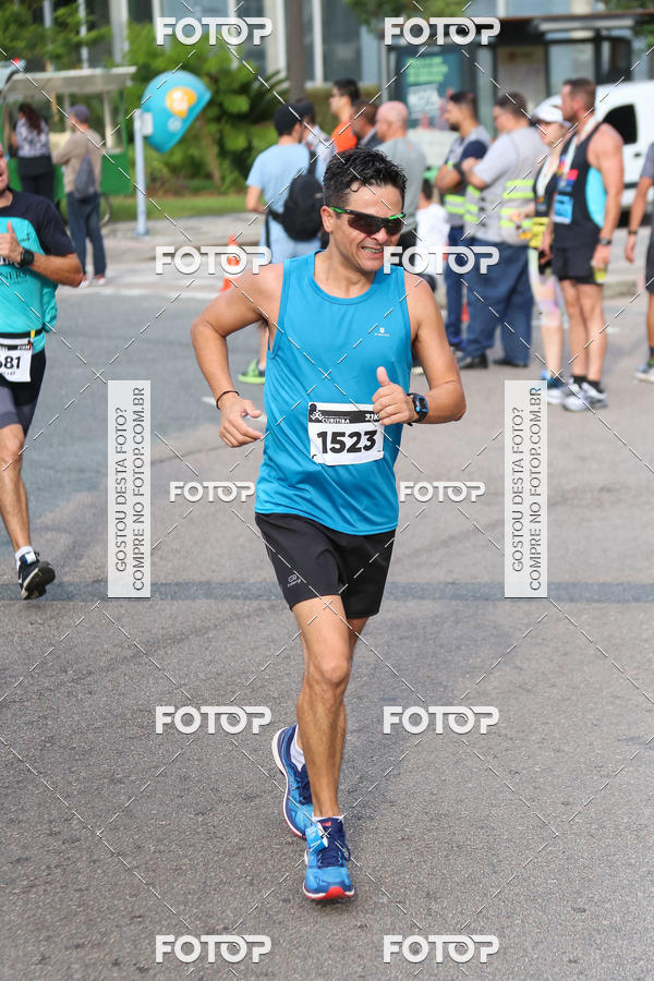 Buy your photos of the eventMeia Maratona Internacional de Curitiba 2018 on Fotop