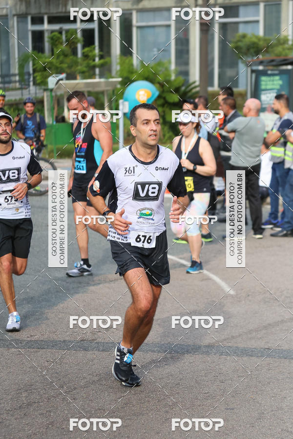 Buy your photos of the eventMeia Maratona Internacional de Curitiba 2018 on Fotop