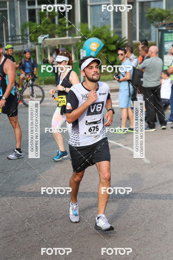 Buy your photos of the eventMeia Maratona Internacional de Curitiba 2018 on Fotop