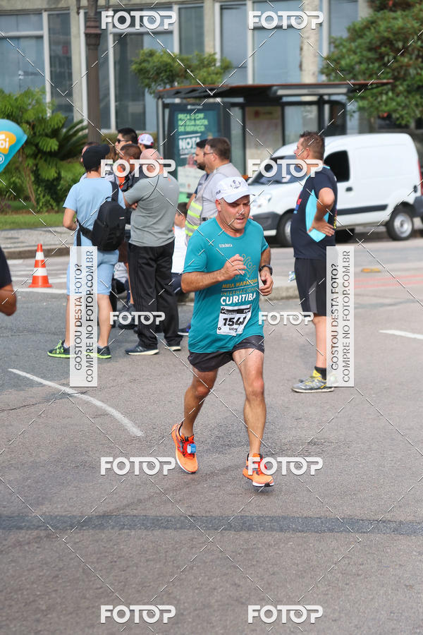 Buy your photos of the eventMeia Maratona Internacional de Curitiba 2018 on Fotop