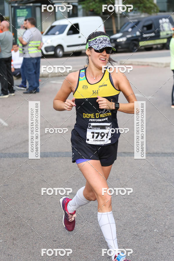 Buy your photos of the eventMeia Maratona Internacional de Curitiba 2018 on Fotop