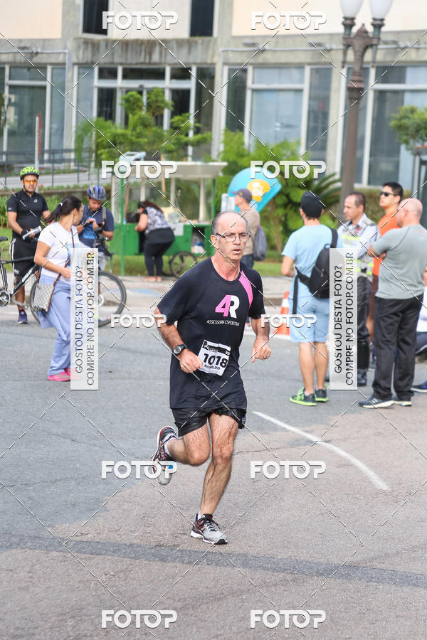 Buy your photos of the eventMeia Maratona Internacional de Curitiba 2018 on Fotop