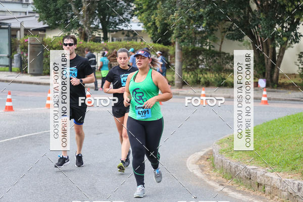 Buy your photos of the eventMeia Maratona Internacional de Curitiba 2018 on Fotop
