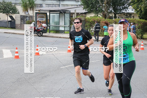 Buy your photos of the eventMeia Maratona Internacional de Curitiba 2018 on Fotop