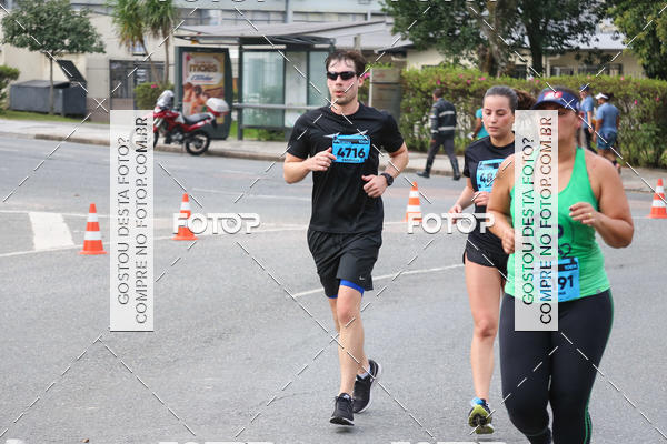 Buy your photos of the eventMeia Maratona Internacional de Curitiba 2018 on Fotop