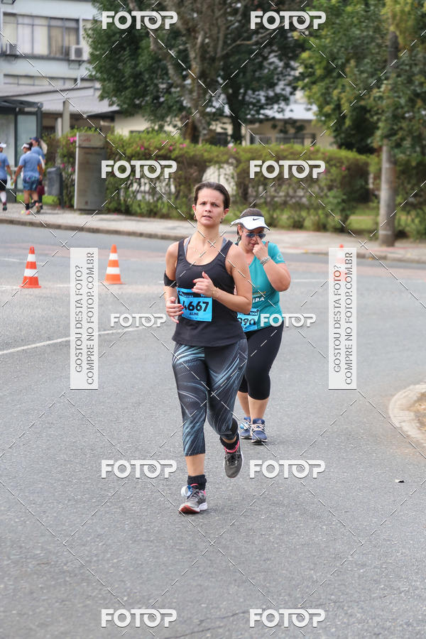 Buy your photos of the eventMeia Maratona Internacional de Curitiba 2018 on Fotop