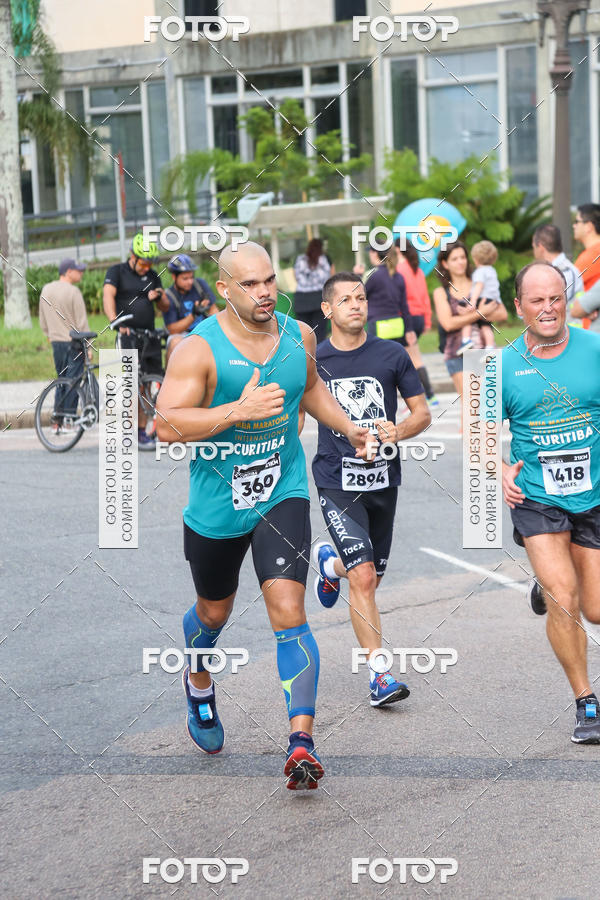 Buy your photos of the eventMeia Maratona Internacional de Curitiba 2018 on Fotop