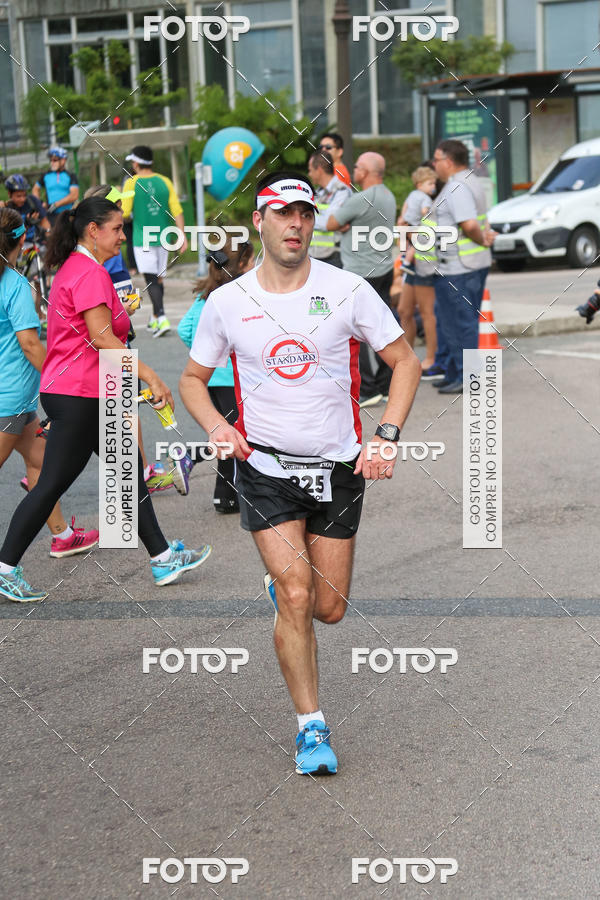 Buy your photos of the eventMeia Maratona Internacional de Curitiba 2018 on Fotop