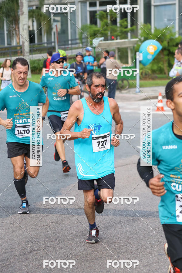 Buy your photos of the eventMeia Maratona Internacional de Curitiba 2018 on Fotop