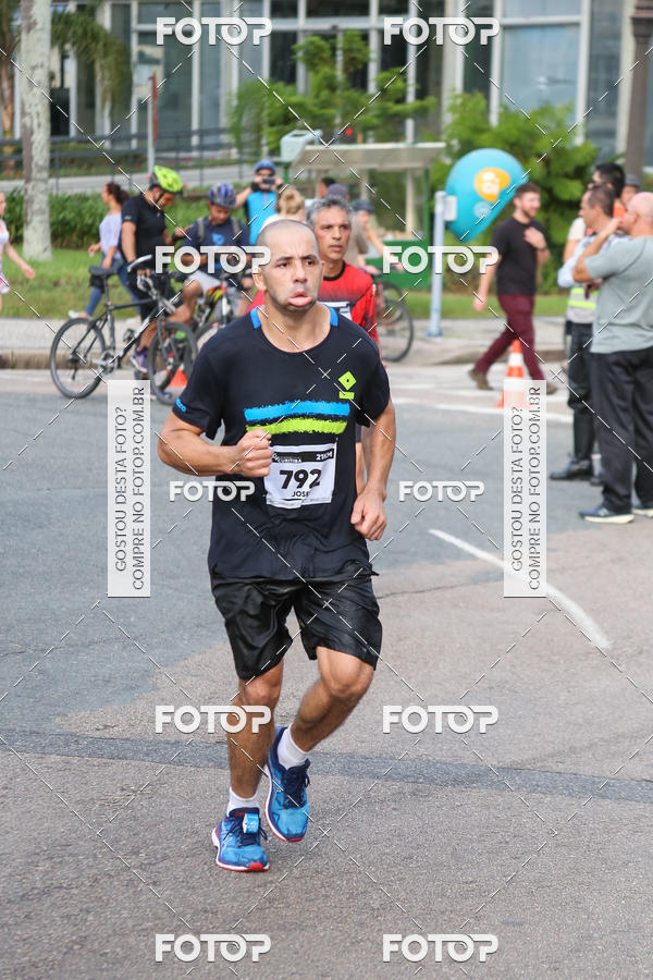 Buy your photos of the eventMeia Maratona Internacional de Curitiba 2018 on Fotop