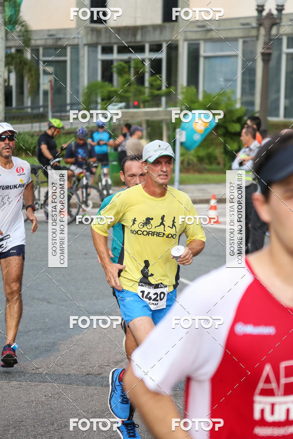 Buy your photos of the eventMeia Maratona Internacional de Curitiba 2018 on Fotop