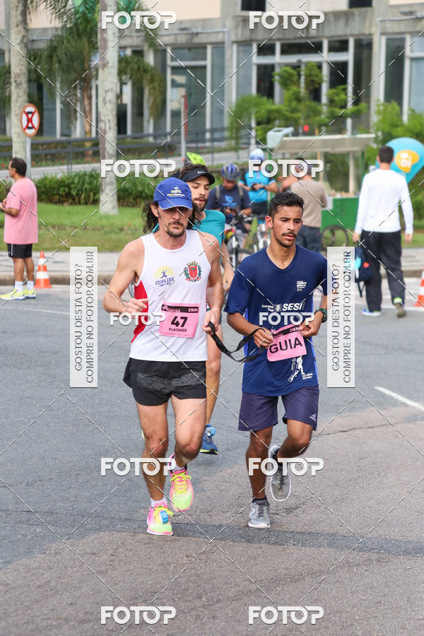 Buy your photos of the eventMeia Maratona Internacional de Curitiba 2018 on Fotop