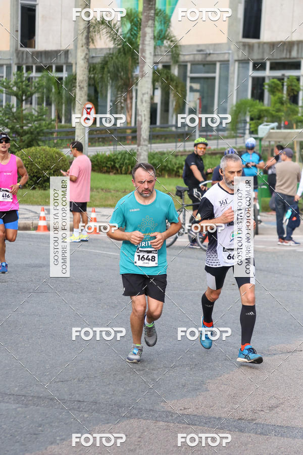 Buy your photos of the eventMeia Maratona Internacional de Curitiba 2018 on Fotop